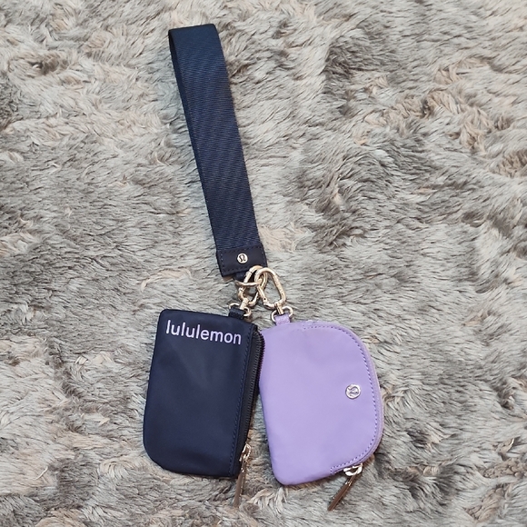 lululemon athletica Handbags - Lululemon Navy and Purple Duo Pouch Wristlet